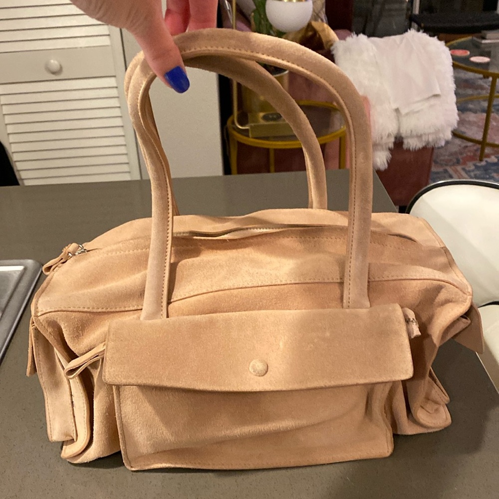 Club Monaco Light Pink real suede purse. Good condition.